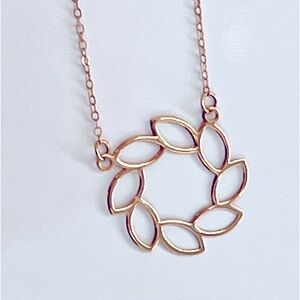 Solid 18 carat, gold leaf  pendant. Gold tone. Brand new